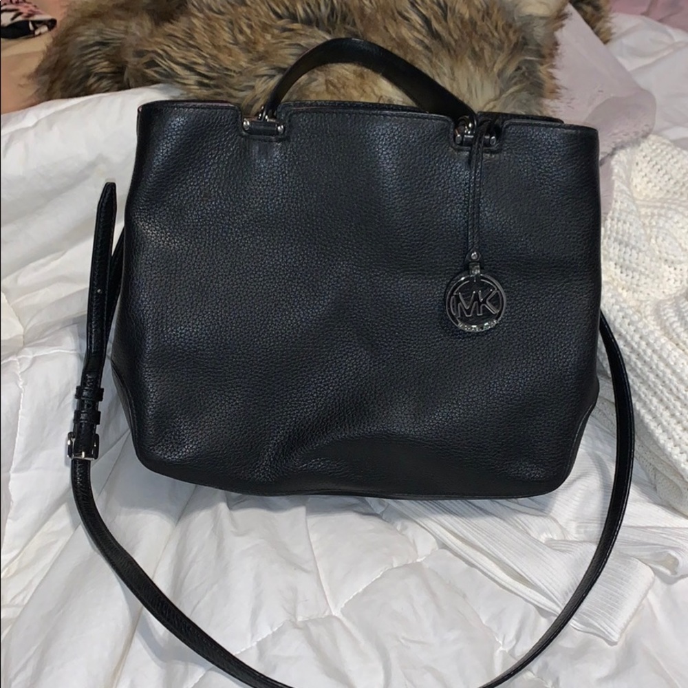 Black Michael Kors bag and cardholder